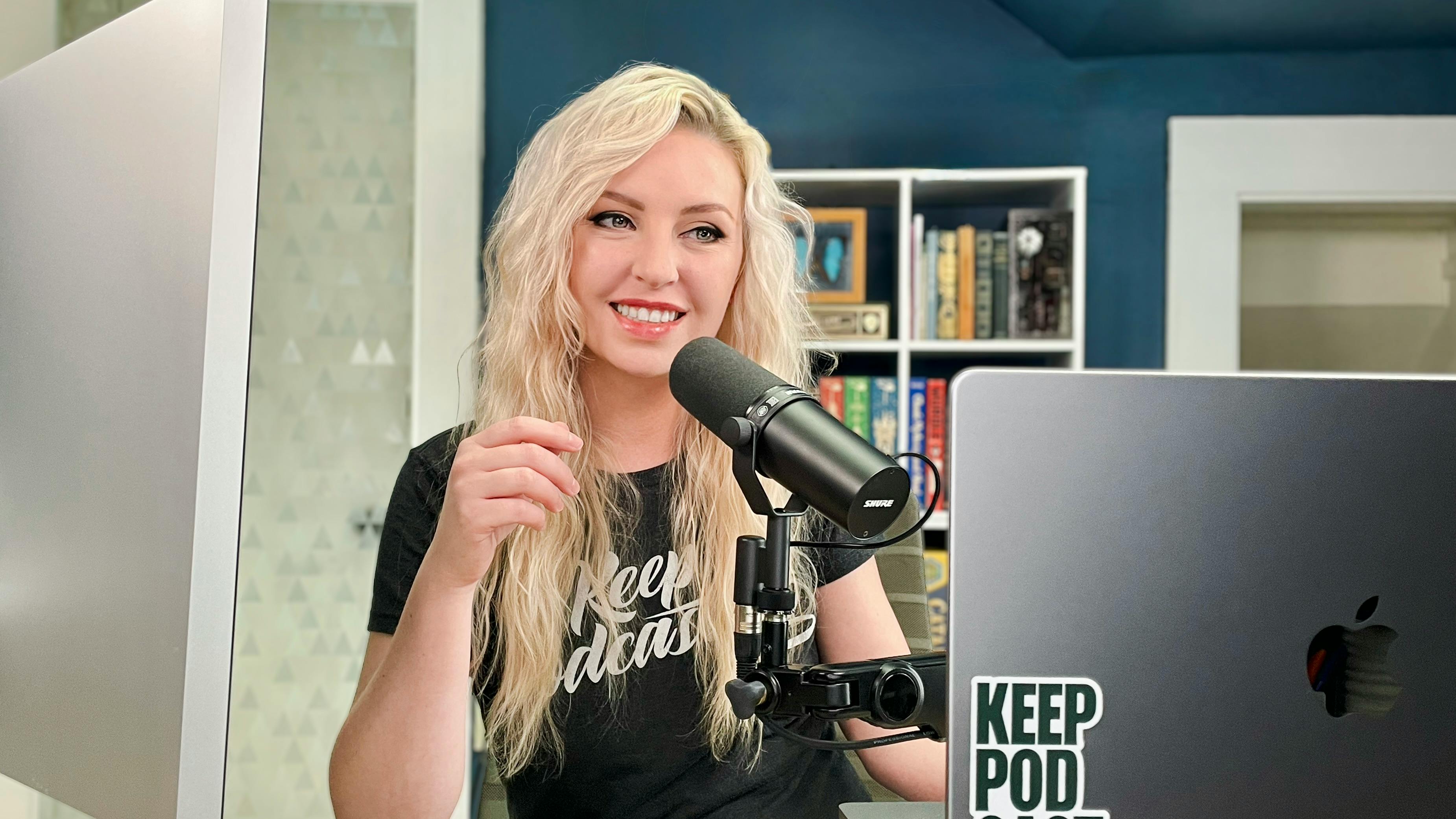 Jordan Blair podcasting at desk