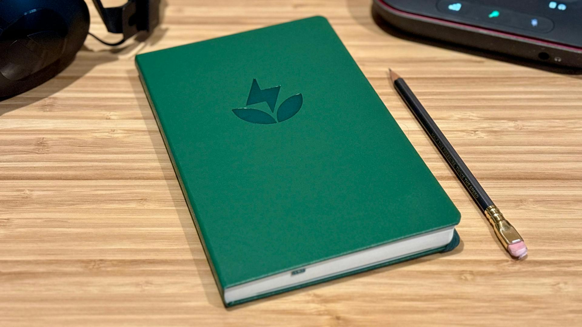 buzzsprout notebook on desk